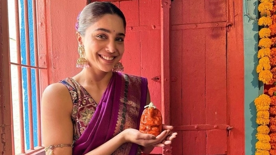 Sharvari chose a violet kanjivaram sari passed down by her grandmother for Ganesh Chaturthi celebrations at her home.