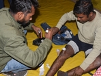 Protester showing injury after lathi charge on him during dharna for re-exam at Gardanibagh in Patna.(Photo by Santosh Kumar)